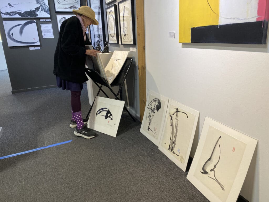 Martha, a Cherished Collector, at my The Cosmos & I Art Show September-October 2024