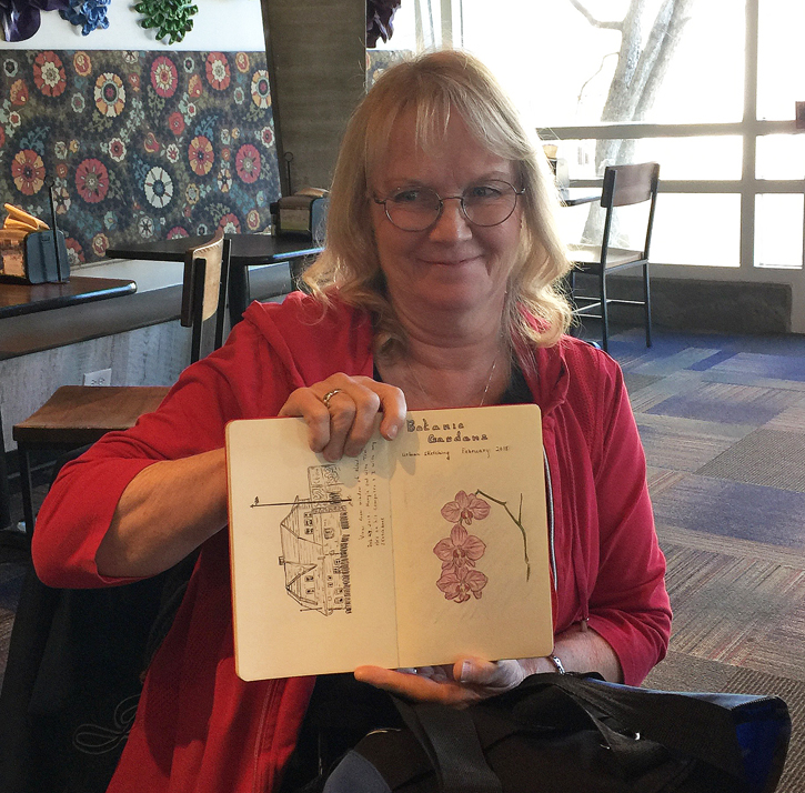 "Kathy with her Sketch of Orchids"