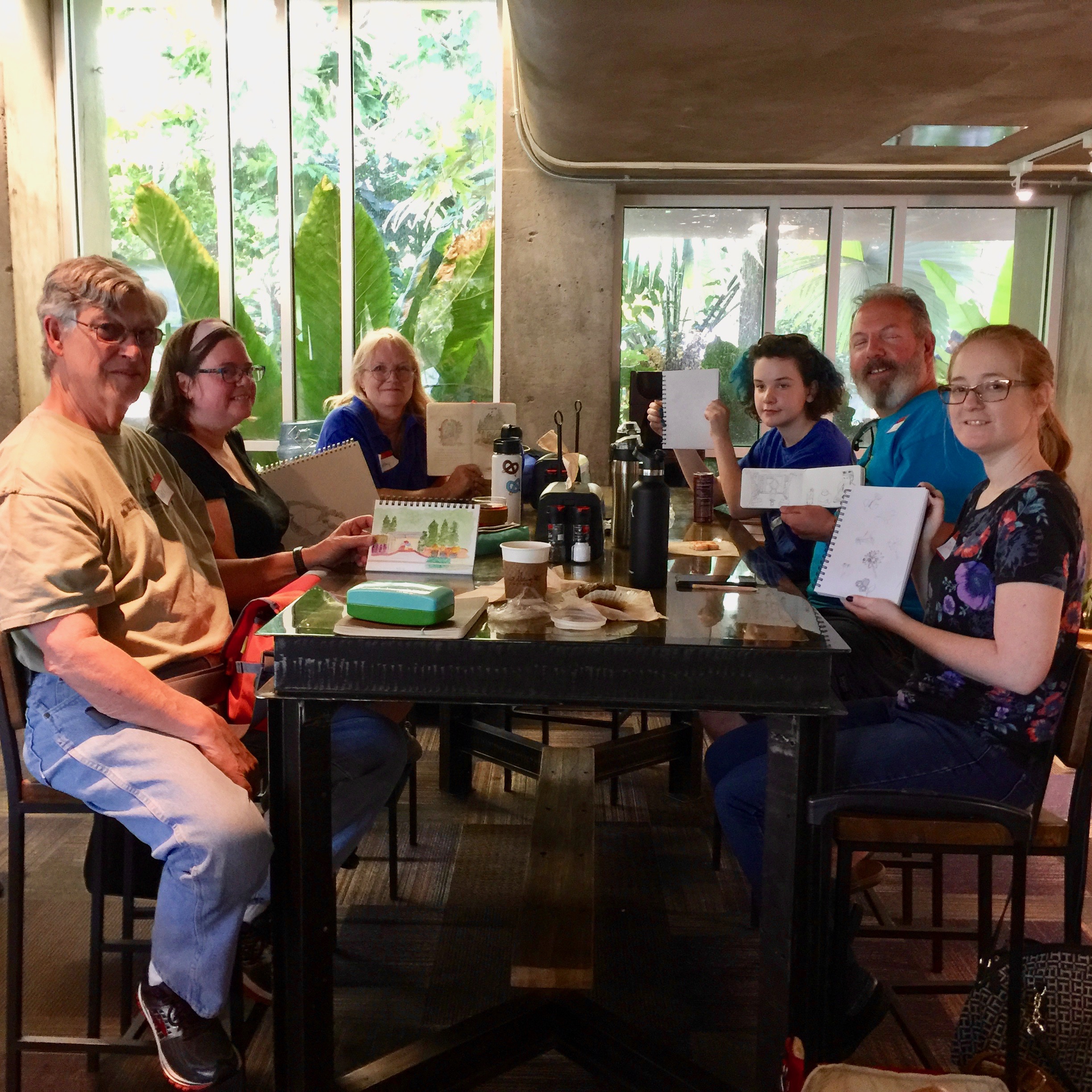 My Denver Urban Sketching Group in July at the Botanic Gardens with their sketchbooks.