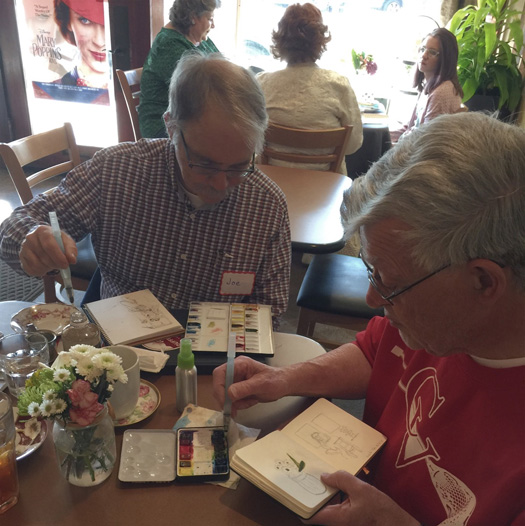 Our guys sketching at Capital Tea on St. Patrick's Day