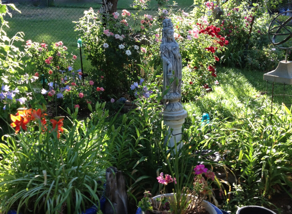 "Marilyn's Kuan Yin and Lilies in her Garden" for Concluding "Find Your Signs to Hope, Peace and Joy"